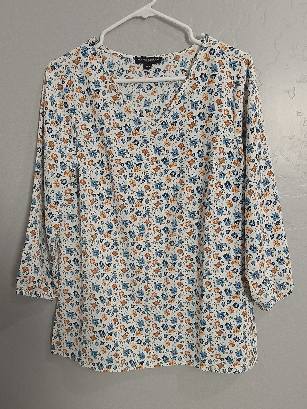 Mario Serrani White Floral V-Neck Blouse with Blue and Rust Accents